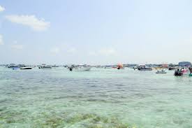 Crab island is only accessible through the water, so you'll need to rent or own transportation to get out there. Crab Island In Destin Florida What Locals Don T Tell You Littles Life Laughter