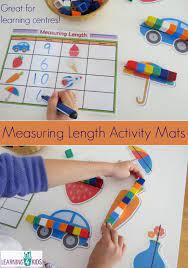 The object is to tilt the box so that the pom pom rolls through the tubes in number order. Printable Measuring Length Learning Centre Mats Measurement Activities Measurement Kindergarten Preschool Math
