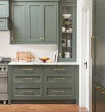 Instagram might be full of all things white, but not everyone wants white kitchen cabinets. Green Kitchen Cabinets Centsational Style