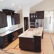 Brown Fantasy Granite Countertop Are Perfectly Paired With Dark Chocolate Kitchen Cabinets Brown Granite Countertops Brown Kitchen Cabinets Dark Cabinets