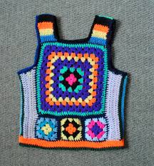 This granny square has a beautiful flower in the center. 1970s Crochet Vest Free Pattern Ecozee News