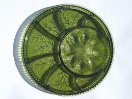 The plate is clear glass. Vintage Green Glass Deviled Egg Plate Relish Tray Indiana Glass Egg Plate Vintage Green Glass Indiana Glass Green Glass