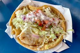 Mariscos (seafood) shrimp tacos (3 pcs) comes with 3 tacos, served with onions, shredded cabbage, cilantro, and tomatoes. The Seafood La 57 Mariscos Truck Is Nothing New San Diego Reader