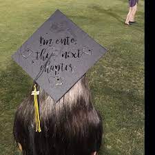 I M Onto The Next Chapter Custom Iron On Decal Quote For Graduation Cap In Silver Graduation Cap Graduation Cap Designs Graduation Cap Decoration