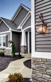 Exterior House Design With Stone And Gray Leah This Is The Style Of Pillars I Keep Talking About House Exterior Exterior House Colors House Colors