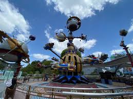 Entering tomorrowland at rope drop (opening). Photos Video Astro Orbiter Takes Off Again With Distancing Measures At Disneyland Wdw News Today
