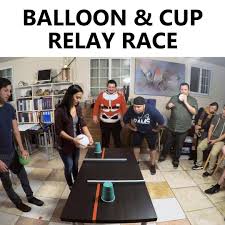 (race, relay) the scouts line up behind a starting line at the shallow end of the pool. Creative Street Balloon Cup Relay Race Facebook