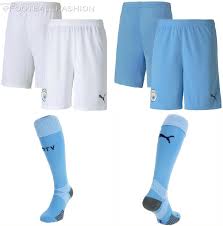 The kit is completed with black shorts and dark blue socks. Manchester City 2020 21 Puma Home Kit Football Fashion