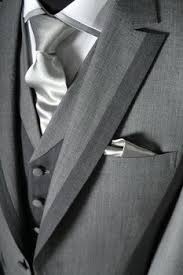 A wide range of men's wedding suits from top uk brands. Photo Via Project Wedding Wedding Suits Men Grey Wedding Suits Wedding Suits Men