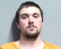 Grand River man arrested after passing out in running car