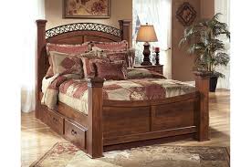 Our king bedroom sets come in every style. Timberline King Poster Bed With Storage Ashley Furniture Homestore