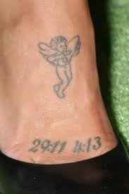 Jessica szohr has a cherub and the numbers 29:11 and 4:13 etched on her foot. Jessica Szohr S 13 Tattoos Meanings Steal Her Style Page 2