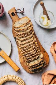 Top the first slice with the radishes and avocado, then top with the second slice, followed by the salmon and a bit of rocket. Seeded Millet Sandwich Bread