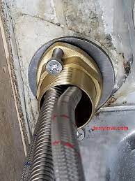 Here, you'll need to remove the handles and spout, then loosen and remove the mounting nuts holding the faucet from above. Kitchen Faucet Nut Won T Budge For Removal Terry Love Plumbing Advice Remodel Diy Professional Forum