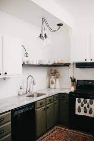 This Atlanta Loft S Style Is Everything But The Kitchen Sink Country Kitchen Countertops Kitchen Remodel Kitchen Remodel Small