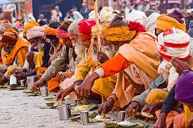 Hindu Pilgrims Eating Holy Prasad - Kumbh Mela 2013 (India)