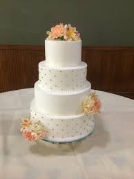 White 4 Tier Wedding Cake With Orange And Pink Flowers Wedding Cake Rock Wedding Cake Decorations Wedding Cake Sizes