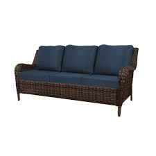 Hampton Bay Cambridge Brown Wicker Outdoor Patio Sofa With Cushionguard Midnight Navy Blue Cushions 65 17148bs The Home Depot Wicker Sofa Outdoor Outdoor Lounge Furniture Blue Cushions