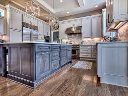 It will surely add instant interests to your kitchen. Fabulous Malibu Two Tone Kitchen Two Tone Kitchen Grey Kitchen Designs Stained Kitchen Cabinets
