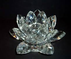 Because it grows out of muddy water, it symbolizes rising. Shannon Crystal Lotus Candle Holder