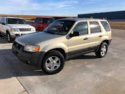 Image result for Gold Ash 2003 Escape