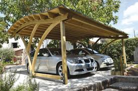 A wooden carport of this size costs around $7,200 when professionally installed over a concrete pad 1, attached to one side of a house, and with two additional walls. Image Result For Free Standing Wood Carport Kits Carport Designs Wooden Carports Free Standing Carport