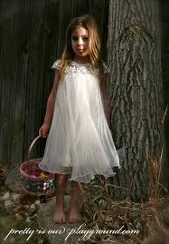 Easter Egg Hunt Little Girl In A White Dress Perfect For A Flower Girl Flower Girl Dresses Toddler Flower Girl Dresses Bohemian Flower Girl Dress