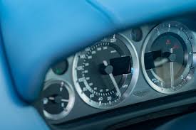 Image result for Slate Blue 2010 Aston Martin