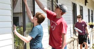 Six photos from UGHS "Broncos Give Back" day