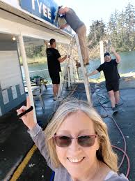Carolyn Jasken, the penultimate promoter of anything that raises the  awareness of salmon, and Port Alberni's connection to these fish, recently  decorated the sign located at the intersection of Johnston and River