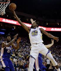 Get a summary of the philadelphia 76ers vs. Golden State Warriors Kevin Durant 35 Lays Up A Shot Over Philadelphia 76ers Joel Embiid 21 During The First Half Of A Warrior Nba Champions Kevin Durant