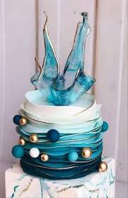 Hands lighting beautifully made cakes. 900 Blue Cakes Ideas Cupcake Cakes Blue Cakes Beautiful Cakes