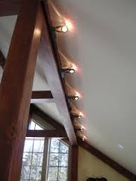 Enlightenment Interior Lighting For A Timber Frame Home Vaulted Ceiling Lighting Ceiling Lights Living Room Interior Lighting