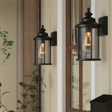 The most prominent characteristic of a farmhouse plan is a porch that stretches along the front of the home and may wrap around to the side or rear. Laurel Foundry Modern Farmhouse Torrence Black Outdoor Wall Lantern Reviews Wayfair