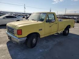 Image result for Bright Yellow 1990 Truck