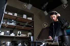 Des écouteurs galaxy buds+ offerts. Young Male In Music Shop Vinyl Records Buying Audio Listening In Headphones Modern Lifestyle Stock Photo Picture And Royalty Free Image Image 84005467