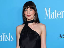Newly single Dakota Johnson reveals she’s ‘psyched for sex’ after Chris Martin split