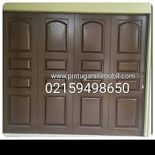 Penggunaan material kayu pada garasi mobil, akan memberi ciri khas bahwa indonesia terdiri atas berbagai macam suku dan budaya. Pintu Besi Pintu Garasi