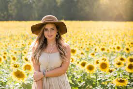 A sunflower field photoshoot with hvphotography. Sunflower Senior Pictures Charlotte Senior Portrait Photographer Naturalbloomphoto Com