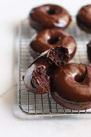 The Most Amazing Chocolate Donuts Pretty Simple Sweet Recipe Chocolate Donuts Recipe Chocolate Glazed Donuts Desserts