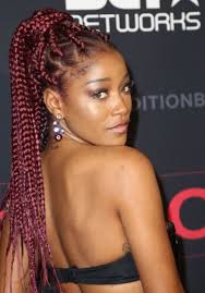 Her hair is braided halfway and she left the rest open, showing off her kinky curly hair. African Hair Braiding Fascinating Styles Different Types Of Braids