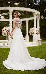 Women's vintage wedding dress cap sleeves lace bridal gown beach boho wedding gown. Perfectly Vintage Designer Wedding Dresses Pretty Happy Love Wedding Blog Essense Designs Wedding Dresses