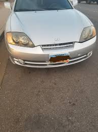 Image result for Triton Green 2004 Tiburon