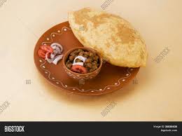 This dish is typically eaten for breakfast. Chana Masala With Puri Or Chole Bhature Image Stock Photo 35038430