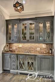 3the Mix Of This Wet Bar Finishes Stainless Brick Custom Faux Wood Finishes That The Upp Rustic Kitchen Cabinets Rustic Kitchen Kitchen Cabinets Makeover