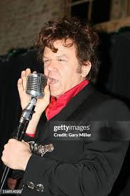 John C. Reilly performs as Dewey Cox from the movie "Walk Hard" at an...  News Photo