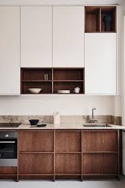 A reddish wood with an open grain. 25 Minimalist Kitchens With Sleek And Edgy Designs Shelterness