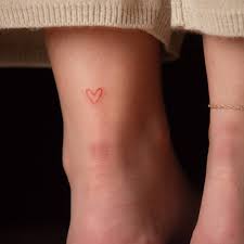 They usually prefer winged heart tattoos. Minimalist Red Heart Tattoo