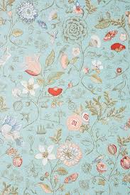 Heraldic shield with floral and diamonds. Espen Turquoise Floral Pattern Wallpaper