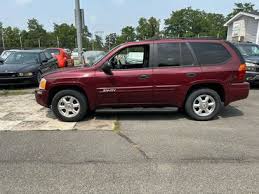 Image result for Red 2003 Envoy